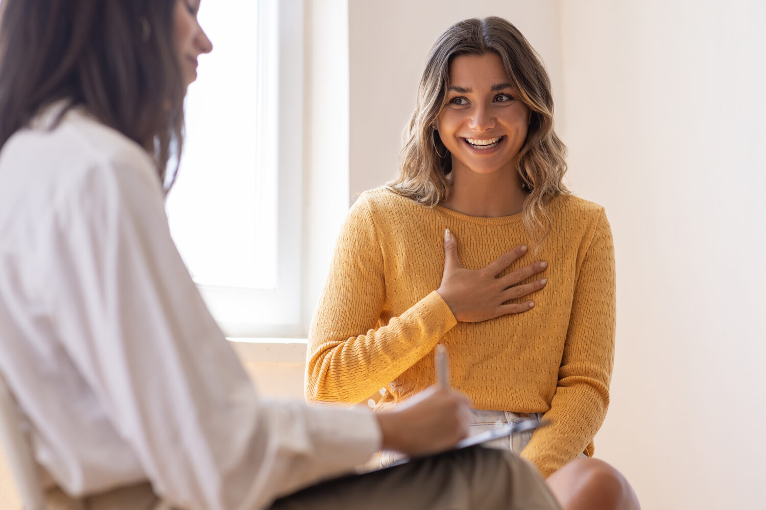 woman talking to a doctor at a clinic