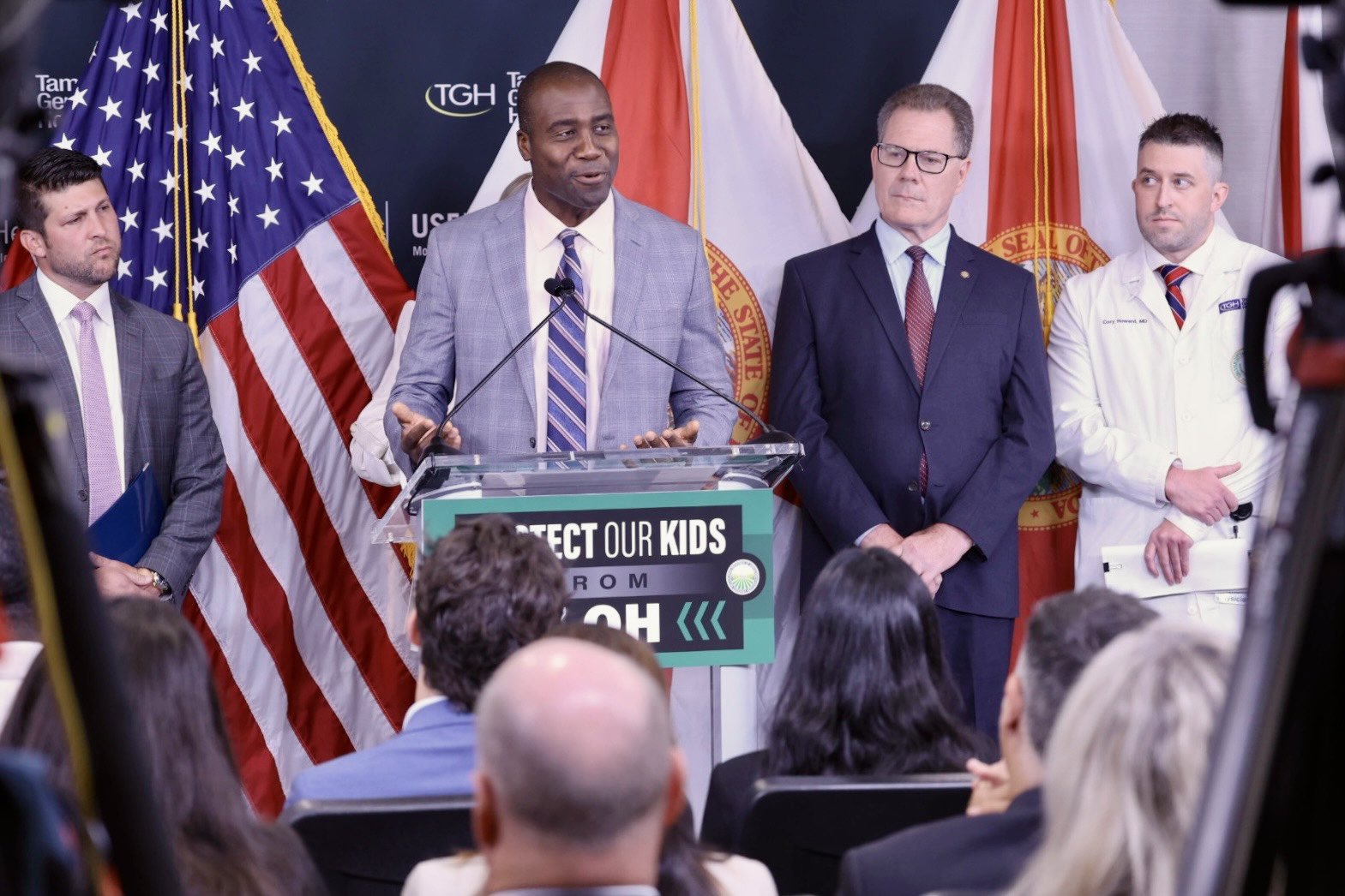 State Surgeon General with Florida's Attorney General at press conference