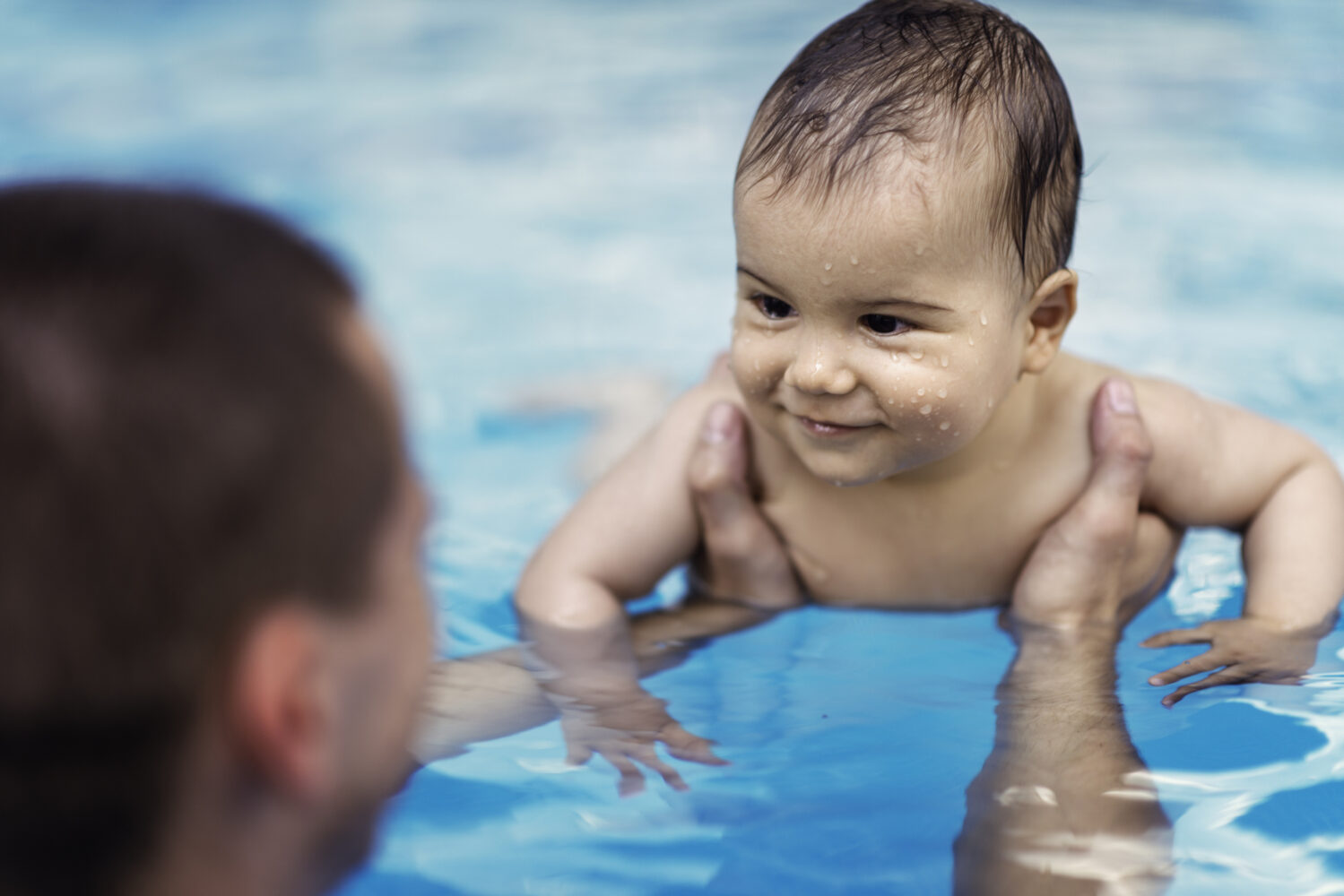Baby Receiving Swimming Lessons